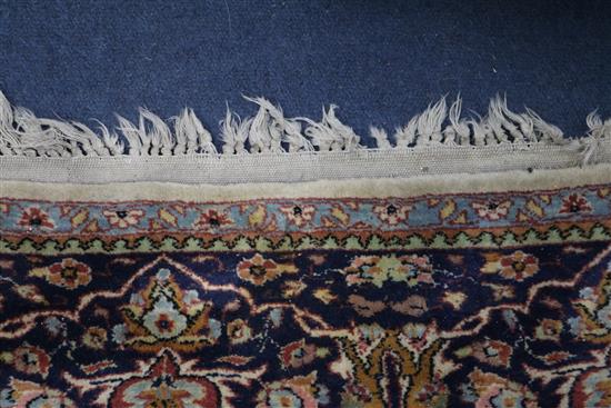 A Persian Tree of life ivory ground carpet W.275 x 180cm